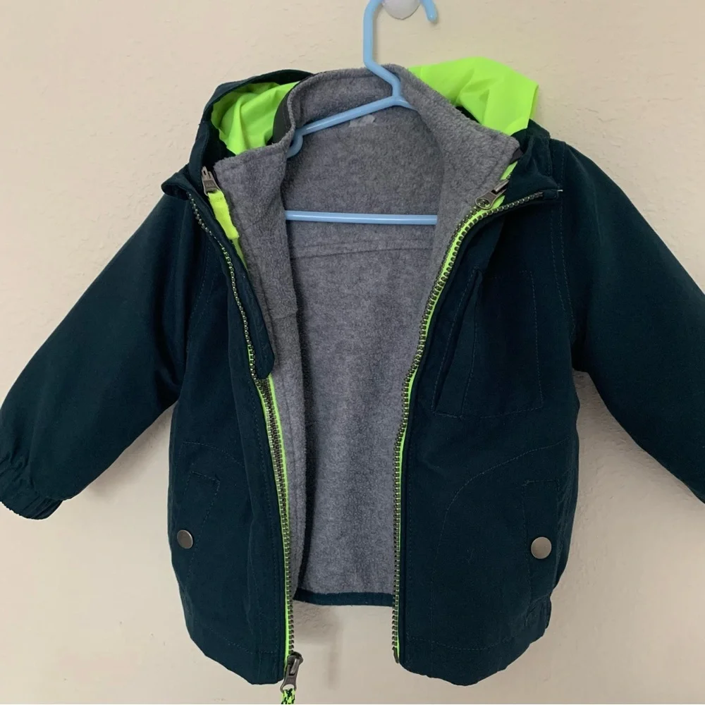 Kids Navy Blue Jacket with Neon Green Accents and zip in removable warm layer‎
